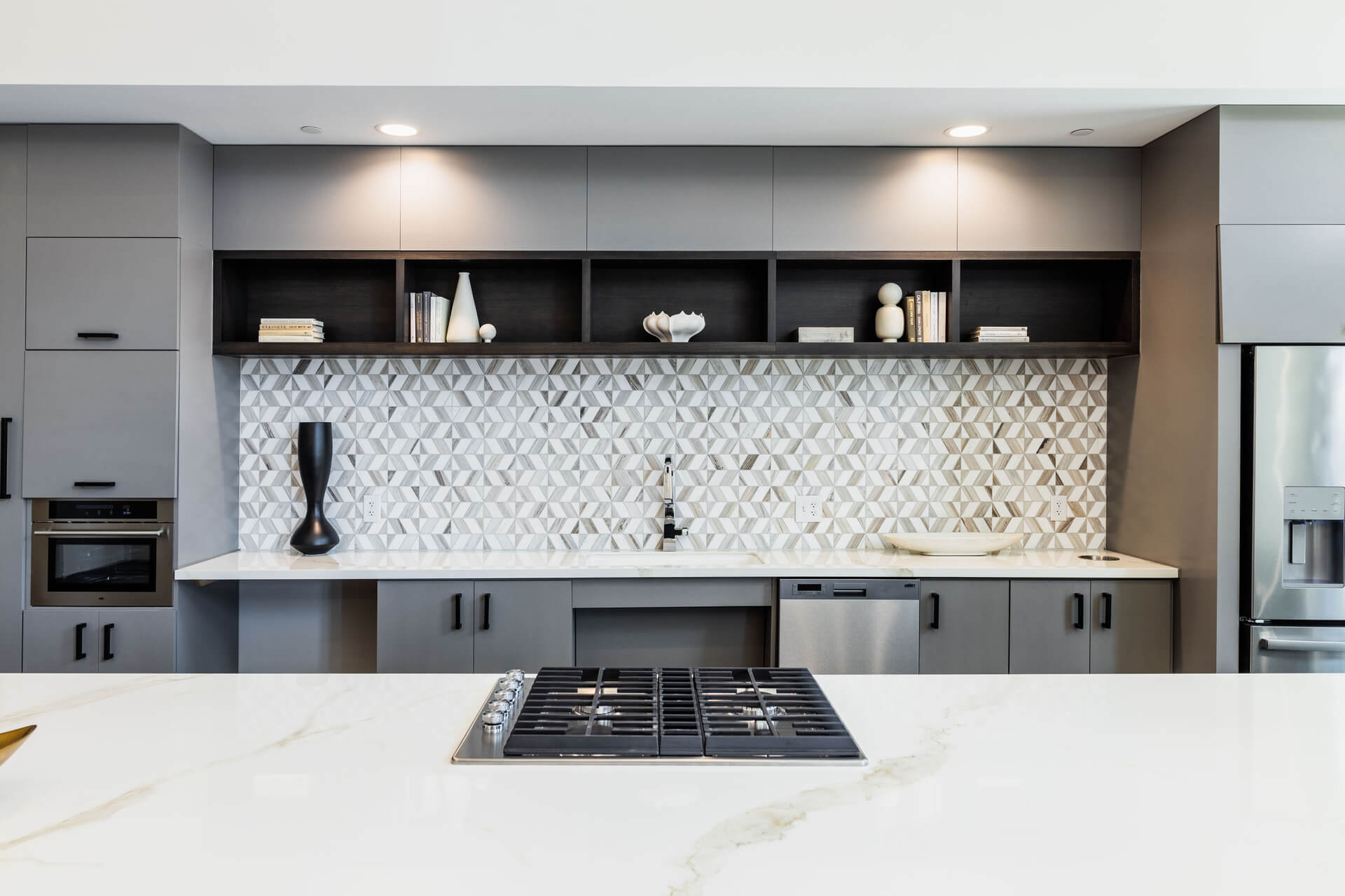 Spacious Lounge Area With White Countertop Kitchenette